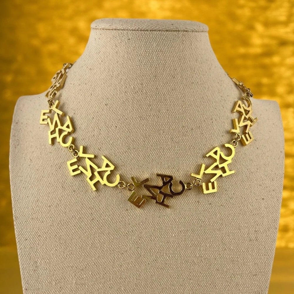 CHANEL Vintage Gold “CHANEL” Charm Letters Necklace